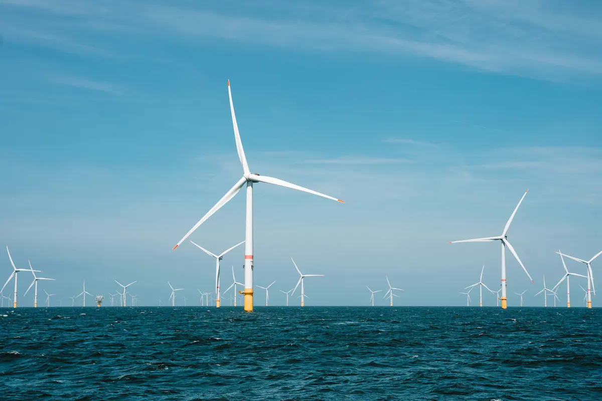 Offshore wind farm turbines at sea — OT cyber security and NIS compliance for offshore transmission operators